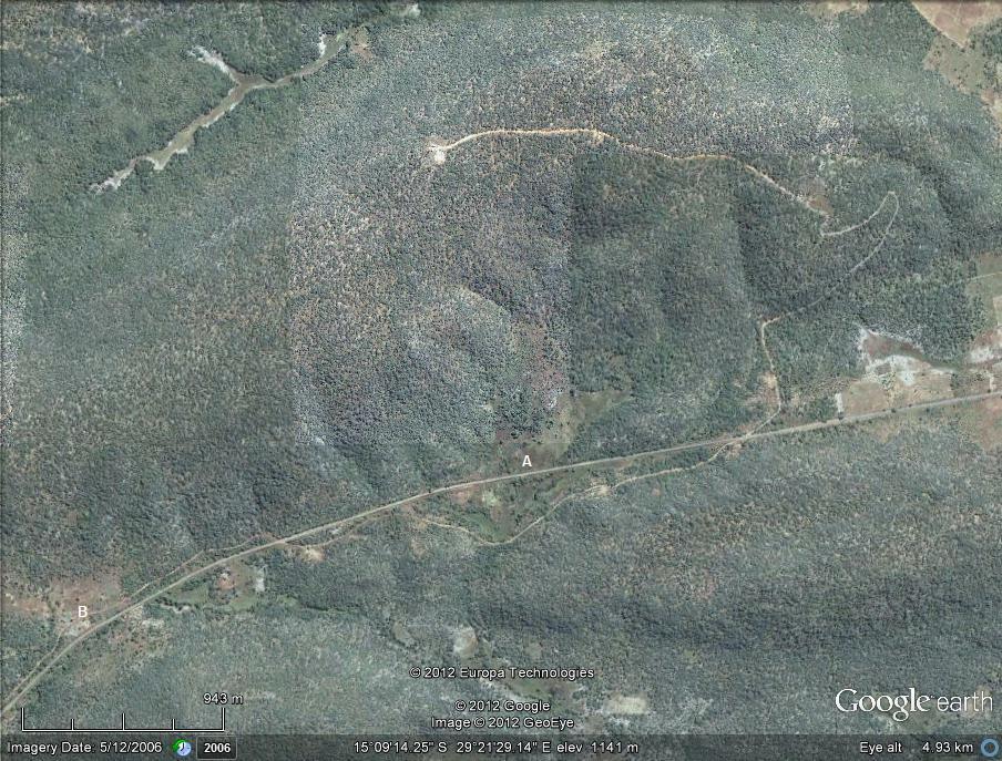 The Chakwenga Headwaters. The Chakwenga arises in the dambo at the bottom left of the photograph (B), and flows eastward before turning south towards its confluence with the Zambezi. A winding track leads to transmitting towers at the crest of the hill. The Nyabutaye (A) is a short tributary of the Chakwenga. The Chakwenga Headwaters. The Chakwenga arises in the dambo at the bottom left of the photograph (B), and flows eastward before turning south towards its confluence with the Zambezi. A winding track leads to transmitting towers at the crest of the hill. The Nyabutaye (A) is a short tributary of the Chakwenga.