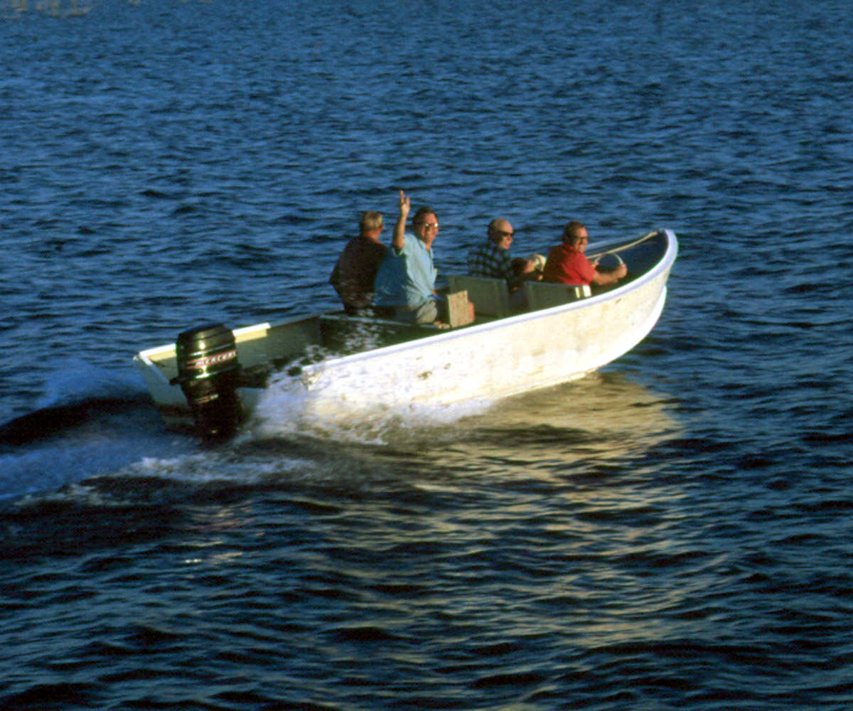 "Botanists afloat". It was taken on Lake Kariba, near the UR/UZ field research station at Sinamwenda in June 1972 during a 3rd year Botany field trip. On the boat, from L to R are: Tom Muller, Brian Walker, Hiram Wild and David Mitchell. At that time Tom was a 3rd Year student and the others were all on the staff of UR in the Botany Dept. "Botanists afloat". It was taken on Lake Kariba, near the UR/UZ field research station at Sinamwenda in June 1972 during a 3rd year Botany field trip. On the boat, from L to R are: Tom Muller, Brian Walker, Hiram Wild and David Mitchell. At that time Tom was a 3rd Year student and the others were all on the staff of UR in the Botany Dept.